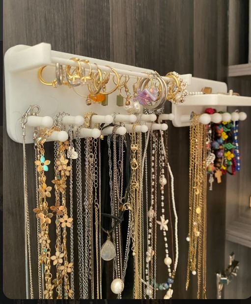 Exhibidor de collares y anillos de pared